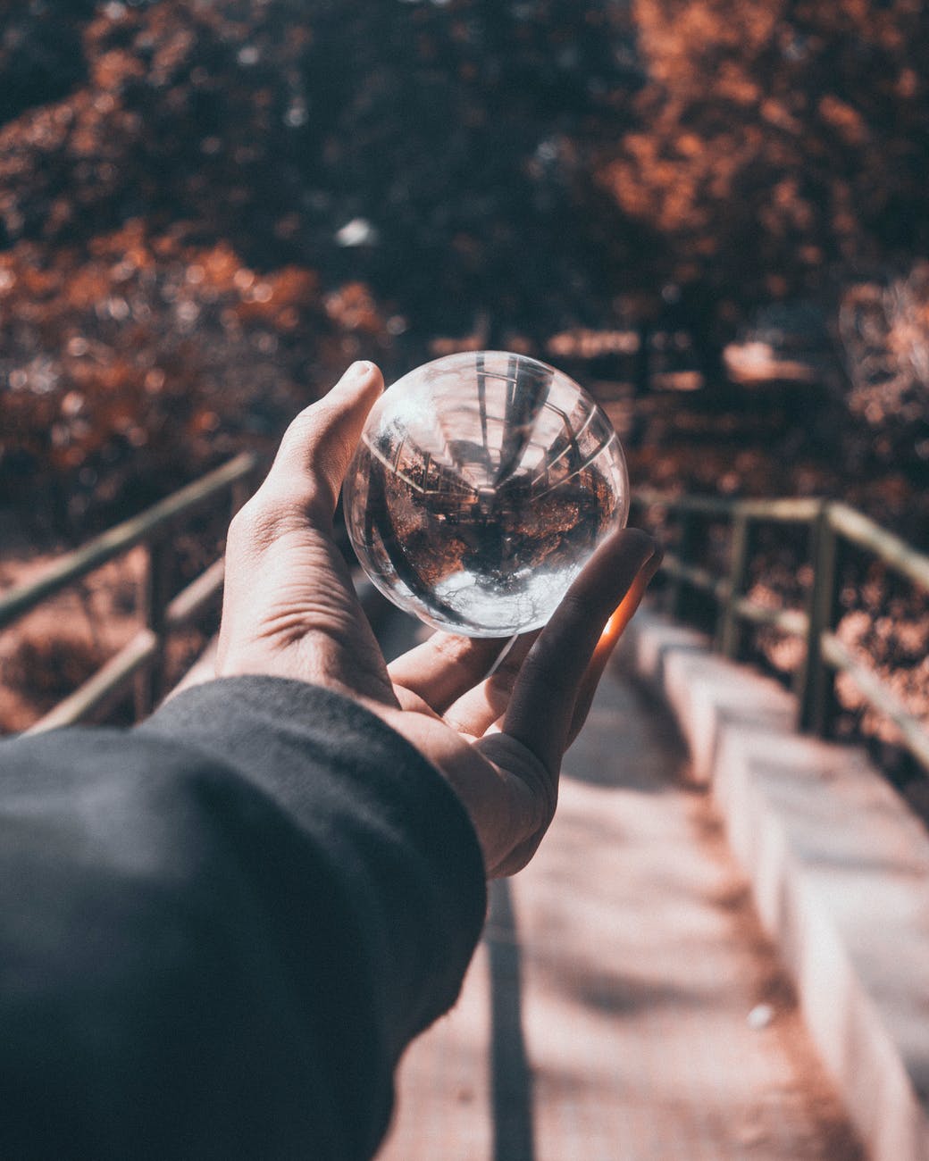 photo of person holding lensball